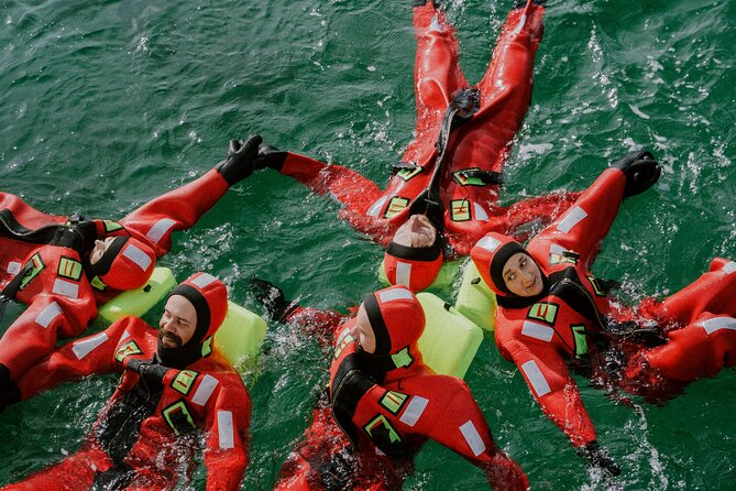 2 Hours Urban Arctic Floating Activity in the Harbours of Tromsø - How They Help You Stay Warm in Chilly Water