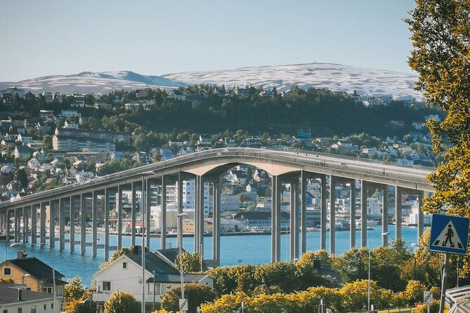 Discover the most Photogenic Spots of Tromsø with a Local - Storgata around Stortorget 2: wooden houses, modern edges, and seasonal life