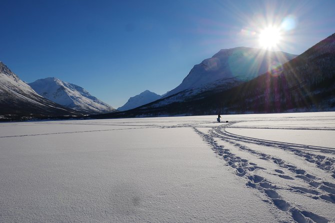 Ice Fishing On The Fjord - Ullsfjord basecamp and the Lyngen Alps lunch scene