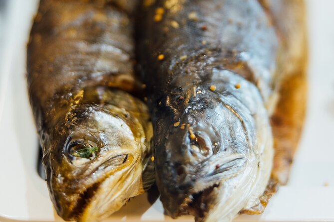 The Tromsø Food Walk, Taste your way through local history - Meeting Point at Stortorget: Find the Arctic Hunter and Settle In