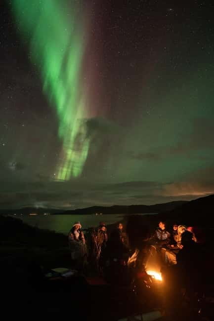 Tromsø: Adult Only Aurora hunt with Citizen Science - The campfire setup: thermal suits, warm soup, and shooting without suffering