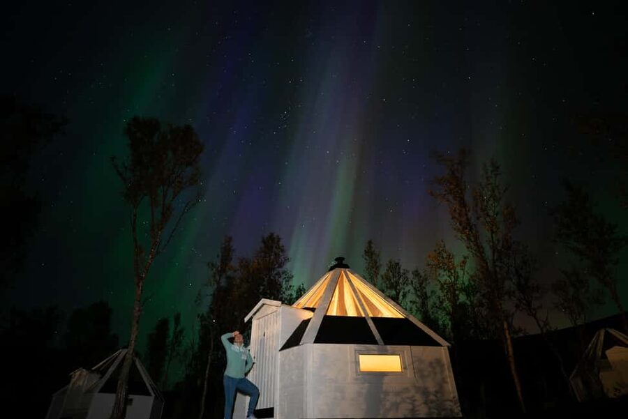 Tromsø: Aurora Crystal Lavvo Overnight Stay with Activities - The heated crystal lavvo: glass ceiling, wood fire, and what to expect