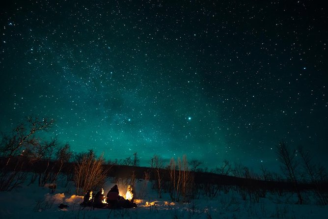 Tromso Aurora Hunt with Bonfire, Soup, Winter Gear & Transfers - Northern Lights guidance and photo tips that help you actually shoot