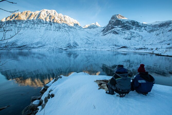 Tromso fjords road trip with fire in grill cabin by the beach. - Why this Tromsø fjord road trip works so well
