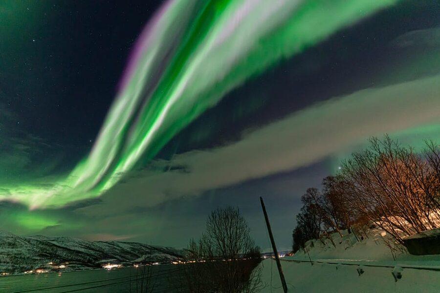 Tromsø: Northern Lights Tour w/Photo, Suits and Local Guide - Stop-by-Stop: How the Aurora Chase Unfolds