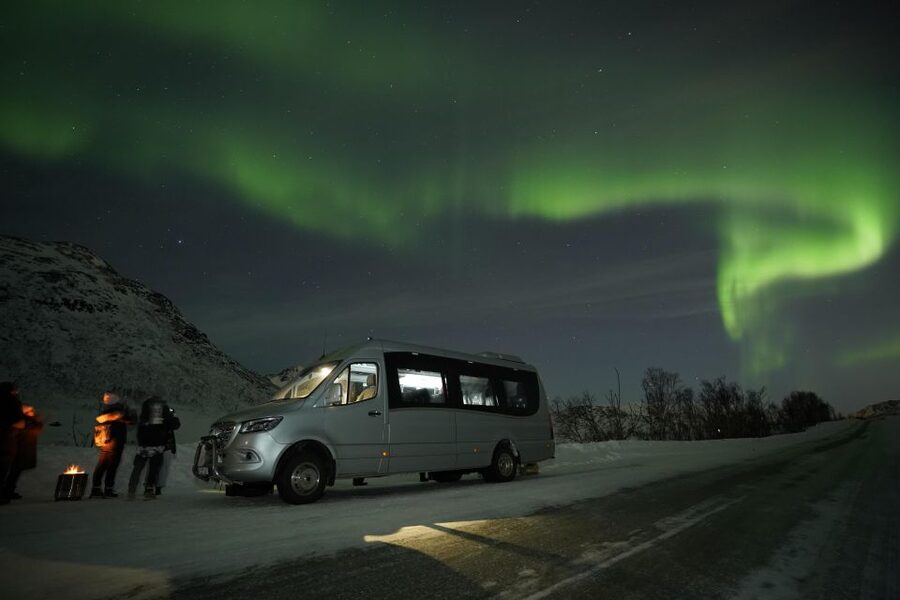 Tromsø: Northern Lights Tour with Free Professional Portrait - The minibus chase: fjords, forests, mountains, and sometimes Finland