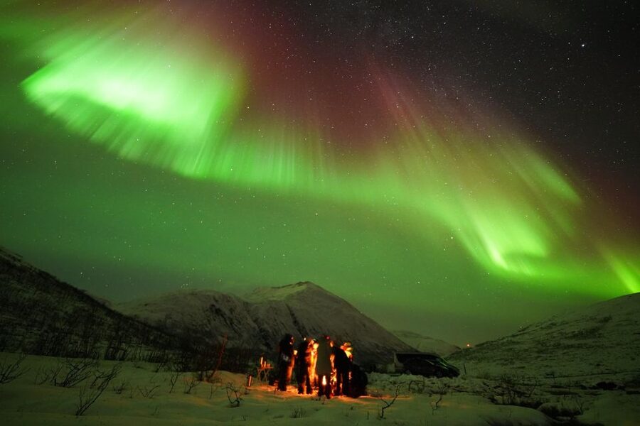 Tromsø: Northern Lights Tour with Free Professional Portrait - Kirkegata 2 meeting point and getting outfitted for the cold