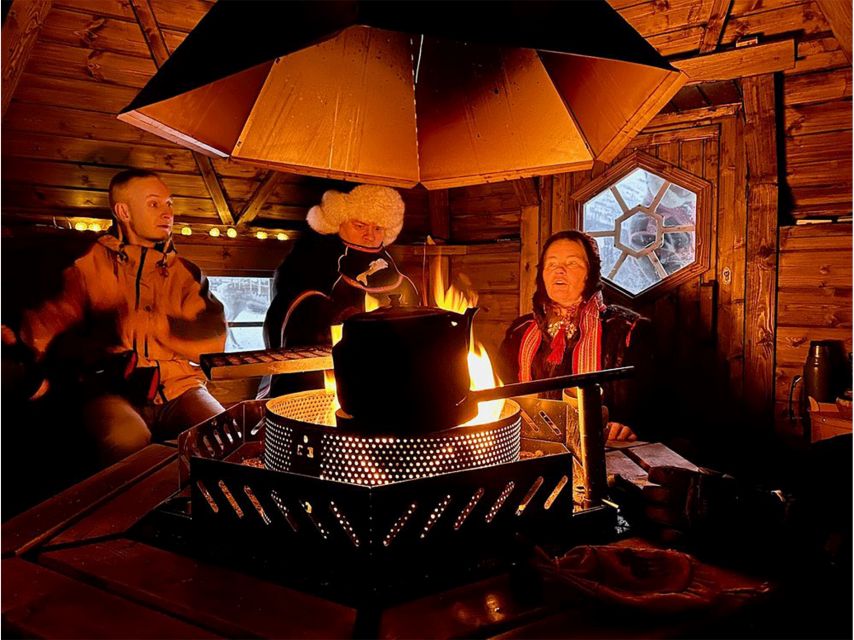 Tromsø: Reindeer Experience at a Sami Camp - Inside the lavvu: fire-warmed coffee, Sami history, and joik around the hut