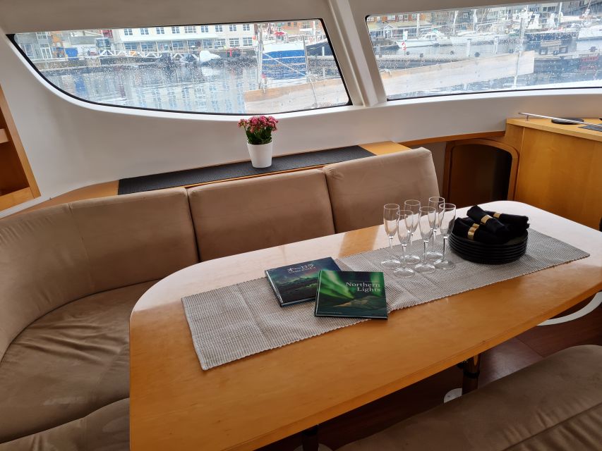 Tromso: Sightseeing Cruise by Catamaran with Snacks & Drinks - The history talk on the water: Tirpitz, fishing, war stories, and Kvaløya